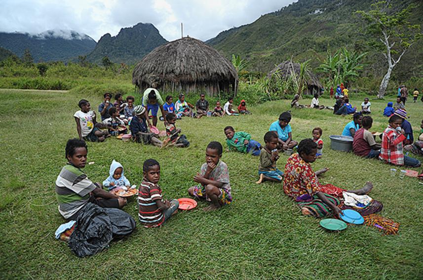 Villagers sharing a meal.